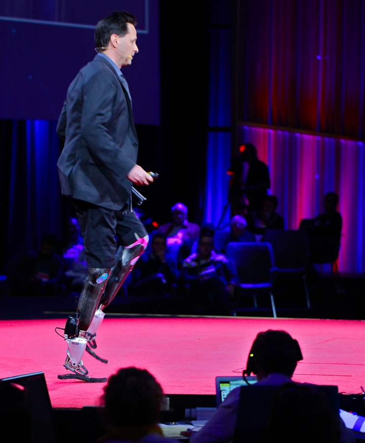 Hugh Herr demonstrating new prosthetic legs at TED 2014.