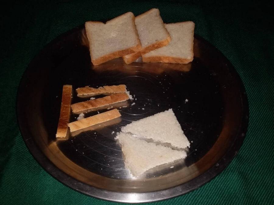 Diagonally cut bread pieces, with margins removed as described in Recipe for Shahi Tukda.