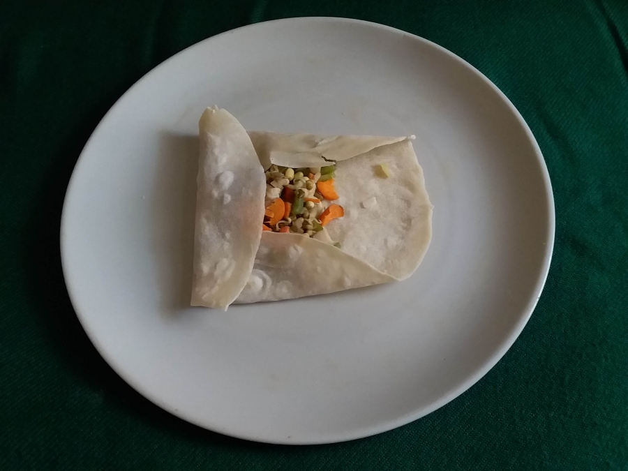 Spring roll being folded (Step -2)