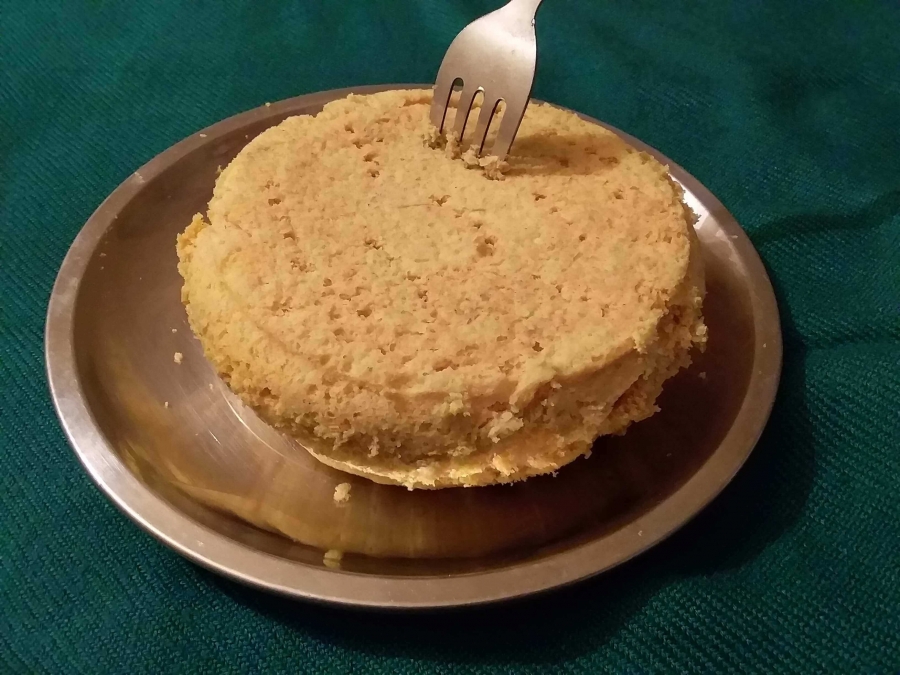 Making holes in upper surface of Dhokla by a Fork as described in  the Recipe of Dhokla.