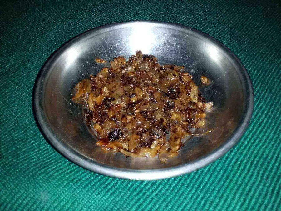 Fried Onion pieces used in Recipe of Chicken Masala