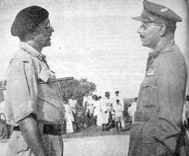 Major General El Edroos (at right) offers his surrender of the Hyderabad State Forces to Major General Joyanto Nath Chaudhuri at Secunderabad.
