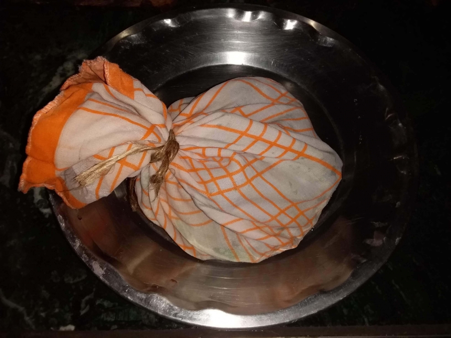 Separating Chena from water, collected from curdled milk is an important step in Recipe for Sandesh preparation.