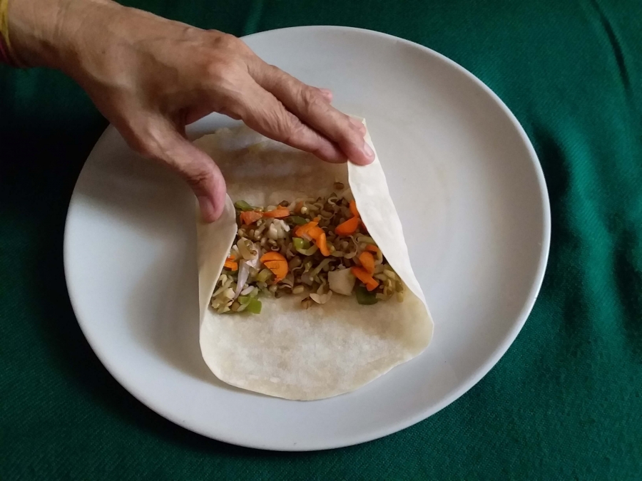 Spring roll being folded (Step-1)