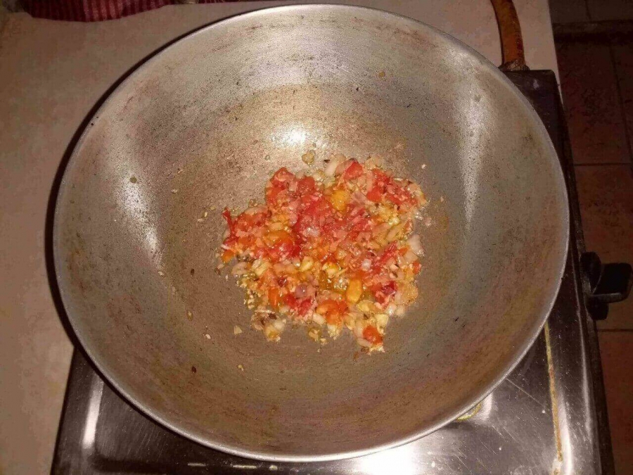 Tadka being prepared for mixing with Sarson Ka Saag in Recipe of Sarson Ka Saag.