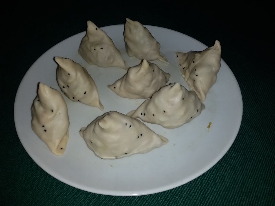 Stuffed uncooked Samosa