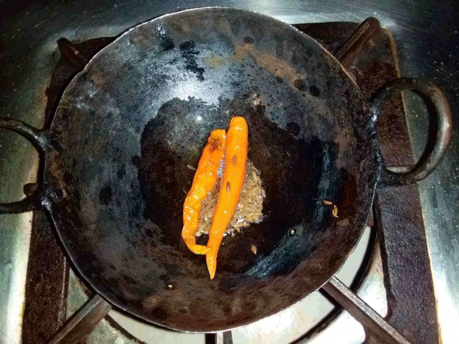 Tadka (for garnishing on the final preparation) being prepared in Recipe for Dal Palak.