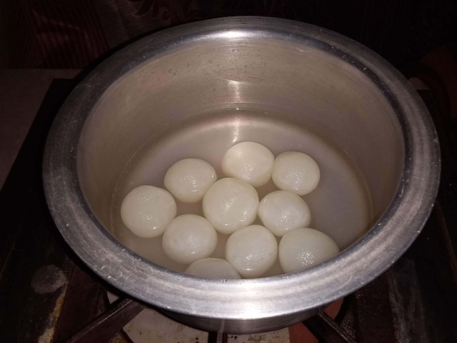 Rasgulla being prepared by using Recipe for Rasmalai.