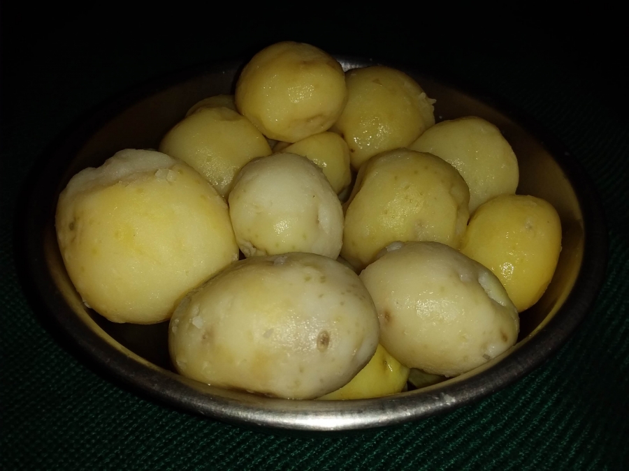 Initial Preparation of Aloo in Recipe of Dum Aloo.